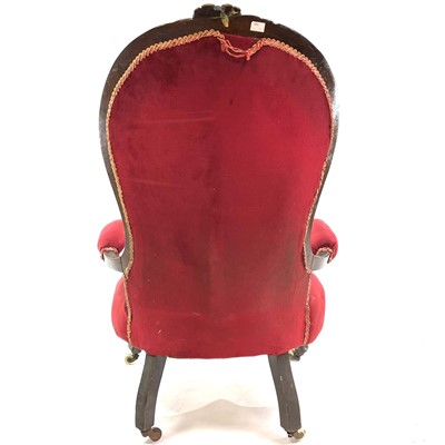 Lot 1900 - A Victorian walnut framed spoon back armchair.