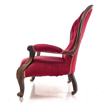 Lot 1900 - A Victorian walnut framed spoon back armchair.