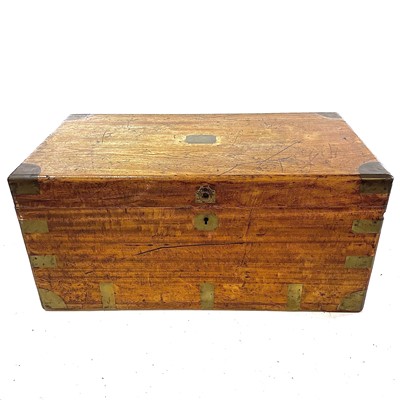 Lot 1808 - A teak and brass bound sea chest.