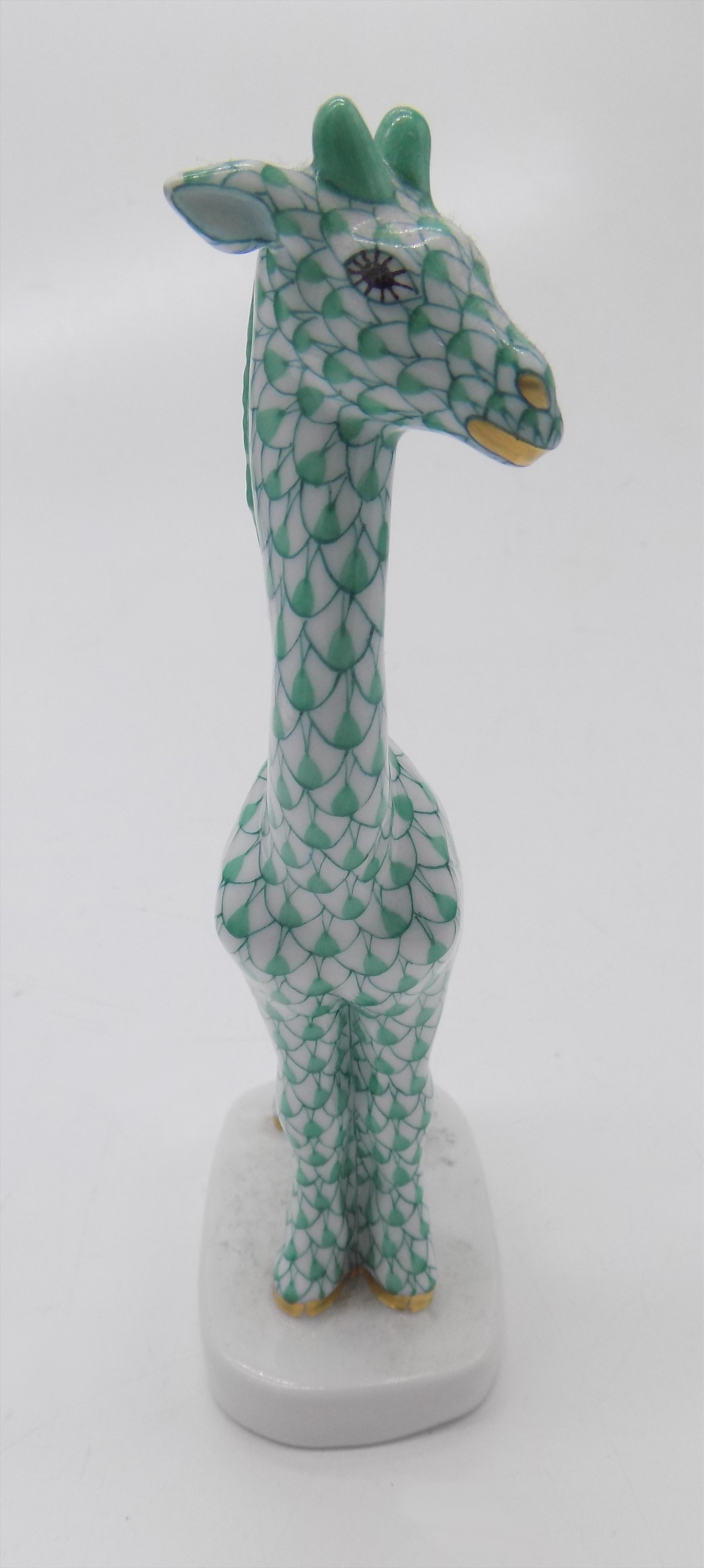 Lot 940 A Herend porcelain giraffe.Height 18.5cm.