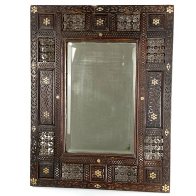 Lot 1029 - A Syrian hardwood wall mirror, 19th century.