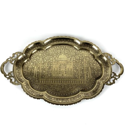 Lot 1030 - A Persian brass twin handled tray, late 19th century.