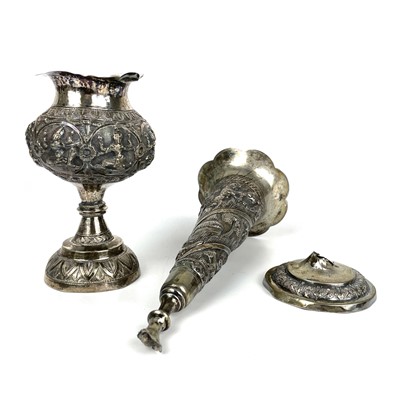 Lot 246 - A Burmese silver embossed pedestal vase and a trumpet vase.