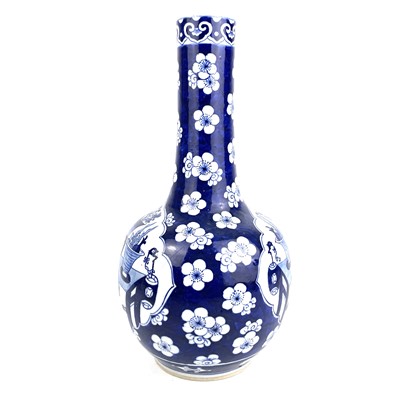 Lot 274 - A Chinese blue and white prunus pattern porcelain bottle vase, 18th century.