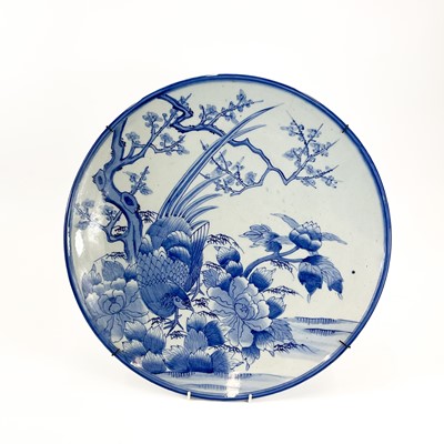 Lot 811 - A Japanese Arita blue and white charger.