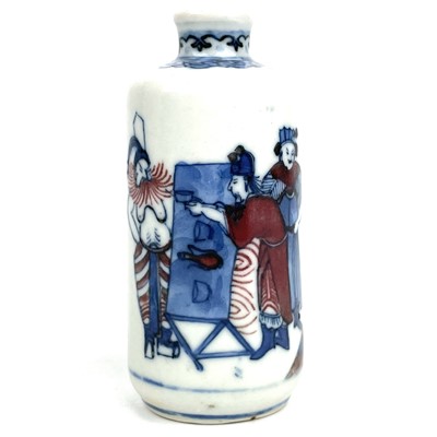 Lot 293 - A Chinese blue and white and copper red porcelain snuff bottle, Qing Dynasty, 19th century.