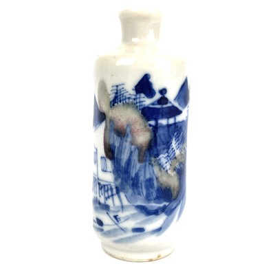 Lot 296 - A Chinese blue and white and copper red porcelain snuff bottle, Qing Dynasty, late 19th century.