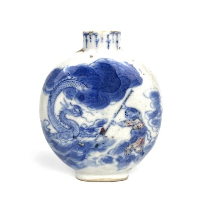 Lot 297 - A Chinese blue and white and copper red porcelain snuff bottle, Qing Dynasty, 19th century.