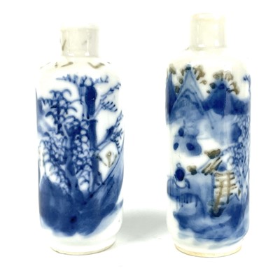 Lot 300 - Two similar Chinese blue & white & copper red porcelain snuff bottles, Qing Dynasty, 19th century.