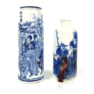 Lot 301 - Two Chinese blue and white and copper red porcelain snuff bottles, late Qing Dynasty.