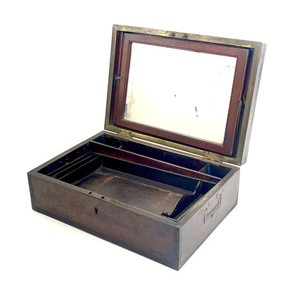 Lot 51 - An early Victorian brass bound mahogany toilet box.