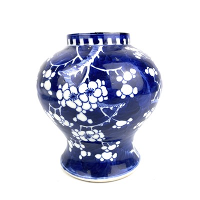 Lot 277 - A Chinese blue and white prunus pattern porcelain vase, 19th century.