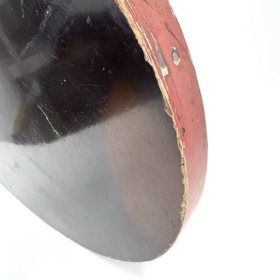 Lot 342 - A large circular red lacquer tray.