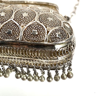 Lot 1045 - An Indian silver filigree purse.