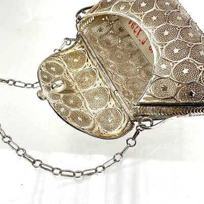 Lot 1045 - An Indian silver filigree purse.