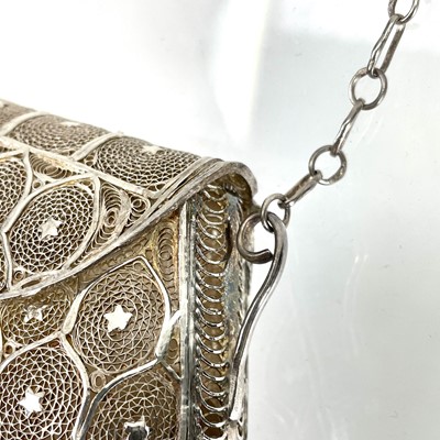 Lot 1045 - An Indian silver filigree purse.