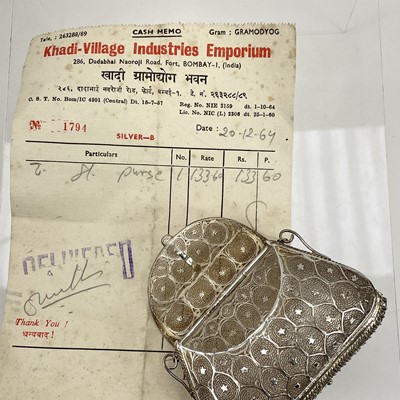 Lot 1045 - An Indian silver filigree purse.