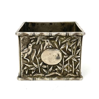 Lot 303 - A Chinese silver napkin ring, 19th century.