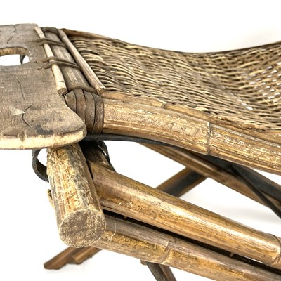 Lot 313 - A Chinese bamboo and softwood folding campaign stool, late 19th/early 20th century.