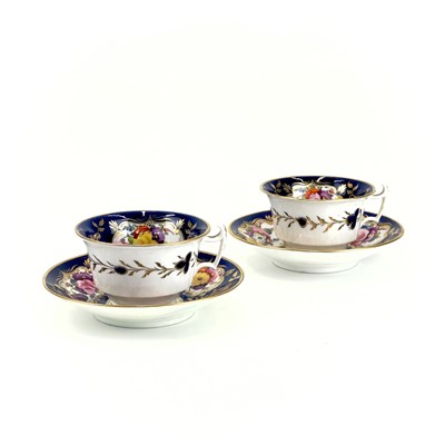 Lot 826 - A Pair of English porcelain tea cups and saucers, probably Coalport.