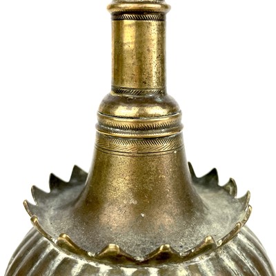 Lot 1051 - An Islamic brass rose water sprinkler, early 20th century.