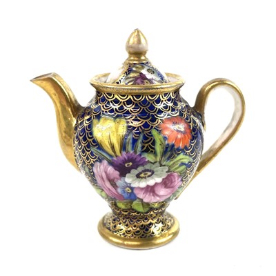 Lot 887 - A Spode porcelain miniature coffee pot and cover finely decorated with bouquets of flowers.