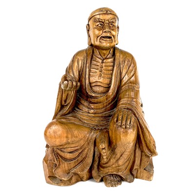 Lot 176 - A Chinese carved hardwood figure of a seated buddha, early-mid 20th century.