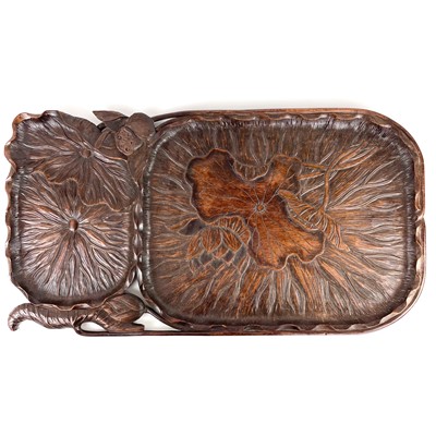 Lot 366 - A Japanese hardwood leaf carved tray, Meiji period.