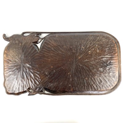 Lot 366 - A Japanese hardwood leaf carved tray, Meiji period.