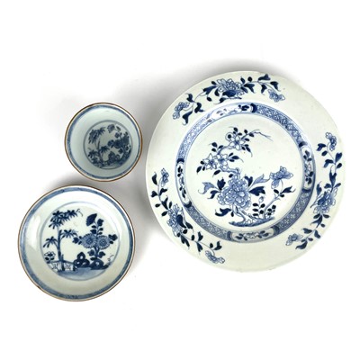 Lot 343 - A Chinese blue and white porcelain Nanking Cargo tea bowl saucer and plate, 18th century.