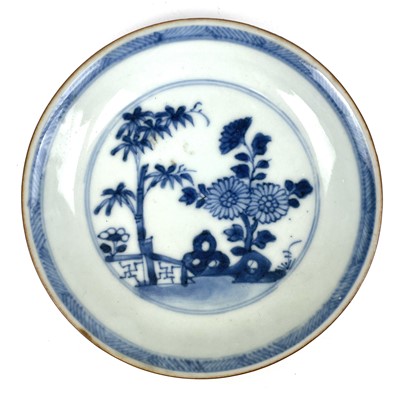 Lot 343 - A Chinese blue and white porcelain Nanking Cargo tea bowl saucer and plate, 18th century.