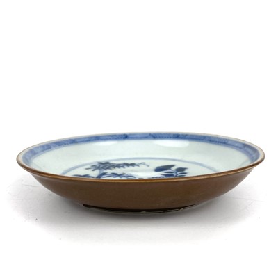 Lot 343 - A Chinese blue and white porcelain Nanking Cargo tea bowl saucer and plate, 18th century.