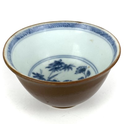 Lot 343 - A Chinese blue and white porcelain Nanking Cargo tea bowl saucer and plate, 18th century.