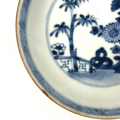 Lot 343 - A Chinese blue and white porcelain Nanking Cargo tea bowl saucer and plate, 18th century.