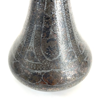 Lot 22 - A 19th century Persian white metal damascened bottle vase.