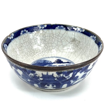 Lot 407 - A 19th century Chinese porcelain blue and white crackle glaze bowl.