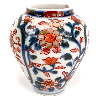 Lot 428 - A 18th century small Japanese Imari baluster vase.