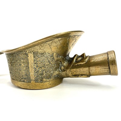 Lot 440 - A Chinese brass vessel or censer modeled as a mythical creature.