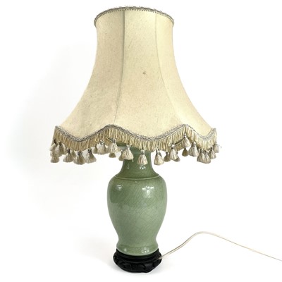 Lot 441 - A Chinese porcelain crackle glaze celadon table lamp.