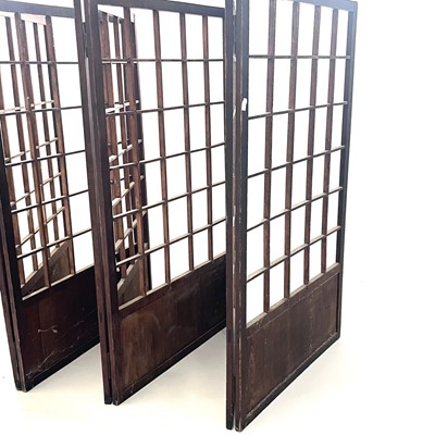 Lot 438 - A Japanese hardwood and pine folding screen, Meiji period.