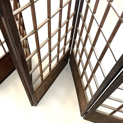 Lot 438 - A Japanese hardwood and pine folding screen, Meiji period.