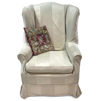 Lot 1850 - A Georgian style wing armchair.