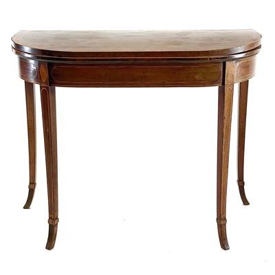 Lot 1818 - A George III mahogany and rosewood banded fold top card table.