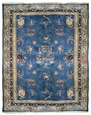 Lot 1293 - A hand made carpet of Chinese design, circa 1920.