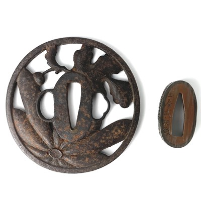 Lot 134 - A Japanese iron tsuba, Meiji period.