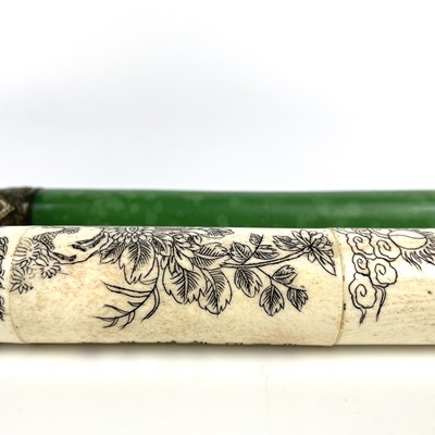 Lot 145 - A Chinese jade opium pipe, mid 20th century