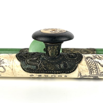 Lot 145 - A Chinese jade opium pipe, mid 20th century