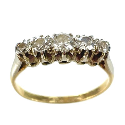 Lot 325 - An early 20th century 18ct and platinum diamond set five stone ring.