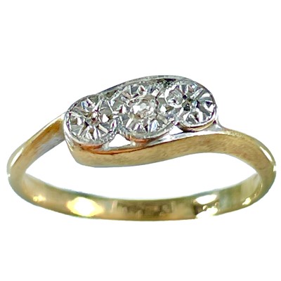 Lot 20 - An early 20th century 18ct and platinum diamond set three stone ring.