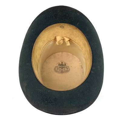 Lot 113 - A Victorian silk top hat and leather case.